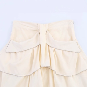 French style tiered apricot mini skirt with ruffle layers and delicate silver bead trim