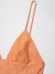 Detailed shot of orange and white striped poplin camisole with thin straps and V-neckline