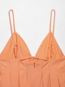 Detail view of orange striped poplin top with pleated waist and hidden zipper