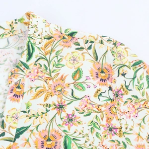 Summer vacation long-sleeved floral print dress with pink and yellow flowers in garden style