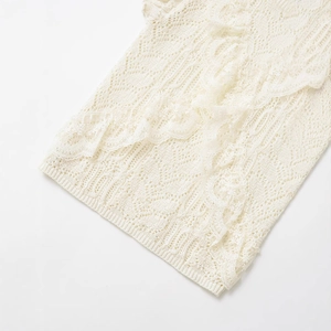 Short sleeve crochet lace top with intricate hollow patterns and romantic ruffled details