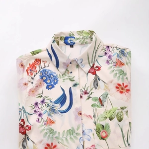 Women's spring 2025 floral satin shirt in cream white with vibrant multicolored flower prints