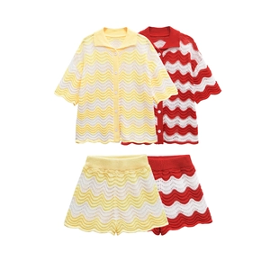 Detail of knit short sets with colorful wave patterns and textured hollow stitching