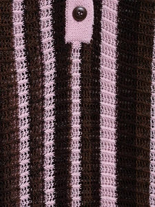 Close-up of pink and brown striped knit fabric with button detail on polo shirt
