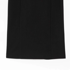 Detailed close-up of high-quality black fabric texture and vertical stitching seams
