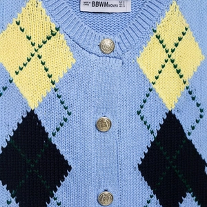 Retro argyle knit cardigan in light blue with gold buttons and V-neckline for women