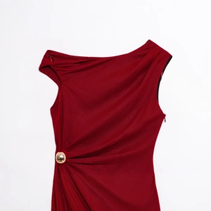 Elegant burgundy sleeveless asymmetric dress with gold buckle and waist pleats detail