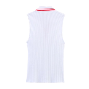Detail shot of white ribbed knit polo top featuring sporty red contrast stripes on collar