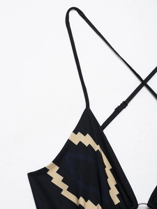 Detail of adjustable spaghetti straps and zigzag geometric print on women summer dress