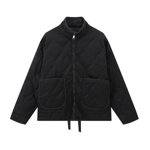 Women's black quilted jacket with standing collar, wavy stitching and large front pockets
