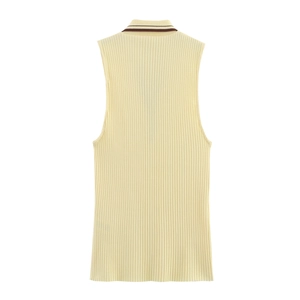 Detailed view of cream ribbed knit fabric and polo collar on sleeveless top