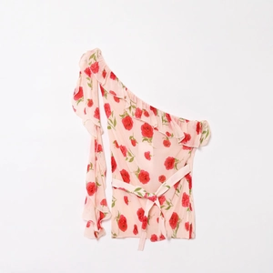 Floral print one-shoulder blouse with ruffled trim and waist tie for a romantic summer look