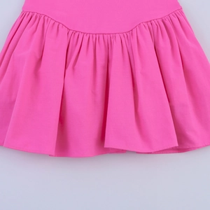 Detailed macro view of pleated hot pink fabric with high-quality double-needle stitching