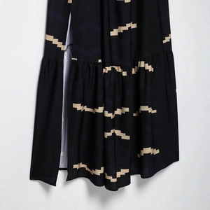 Sexy backless black summer dress with geometric print, slit detail and ruffled hemline
