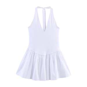 Summer white halter neck pleated dress with deep V-neckline for a fresh vacation look