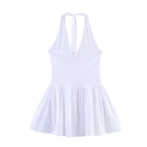 Detailed back view of a white halter neck summer dress with elegant backless tie design