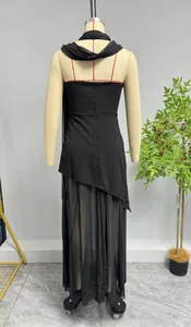 Back view of a black halter neck dress featuring an irregular mesh patchwork hemline