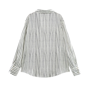 Back view of white striped satin shirt showing curved hem and buttoned sleeve cuffs