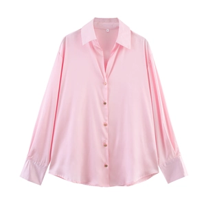 Elegant light pink long-sleeved satin blouse with a silky texture and metallic buttons