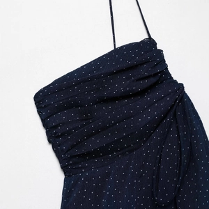 Polka dot V-neck camisole dress with pleated bodice detail and thin straps in navy blue