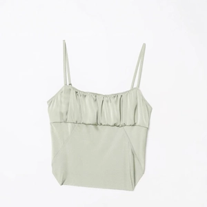 Slim fit sage green satin midi slip dress with ruched bust and thin straps on white background