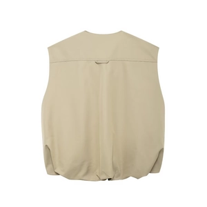 Detail view of khaki sleeveless vest back featuring a horizontal seam and hanging loop