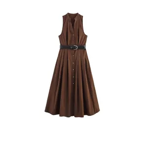 Brown sleeveless V-neck dress with button front and black belt in a minimalist style