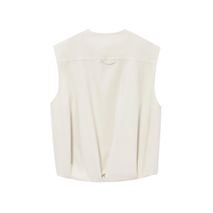 Detail of light beige sleeveless vest back featuring a center vertical pleat and horizontal seam