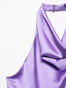Detail of lavender satin halter jumpsuit showing back neck button closure and fabric texture