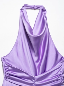 Detail of purple satin halter neck top with cowl neckline and elegant side draping