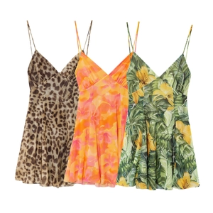 Detailed comparison of leopard print and floral patterns on summer slip dresses
