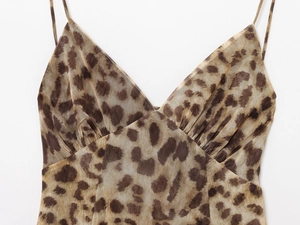 Close-up of leopard print camisole with spaghetti straps and ruched V-neck detail