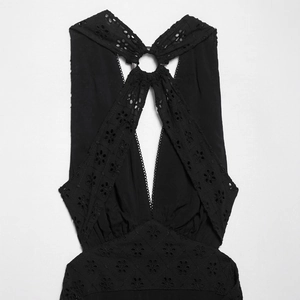 Women's black halter neck hollow out embroidery dress with a deep V-neckline