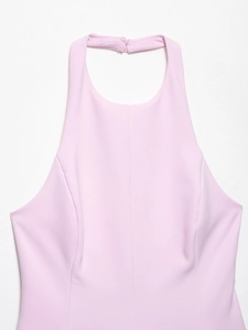 Detail of the high-quality light pink halter neck top with smooth woven fabric and stitching