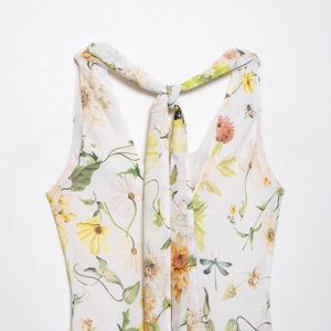 Elegant floral print summer dress with chic cowl neck and back tie halter detail