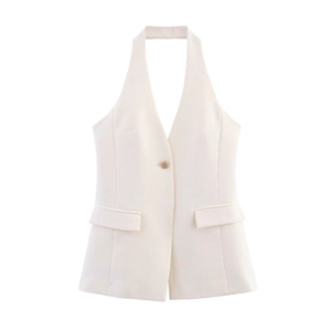 Minimalist beige halter neck vest with a single gold button and deep V-neckline
