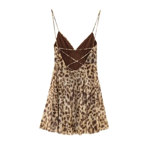 Detail of leopard print dress showing thin straps and crisscross back tie design