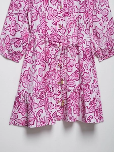 Detail of floral paisley print dress with waist drawstring and wooden bead accents