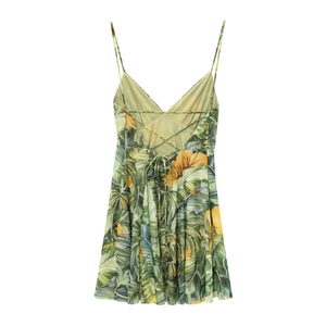 Detail of tropical floral print sun dress with thin straps and lace-up open back