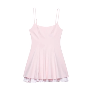 Pink minimalist slip dress with a ruffled striped hem for a sweet summer look