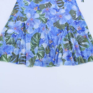 French vintage floral summer dress with blue tropical print and pleated mesh hemline
