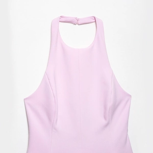 Summer pink halter neck sleeveless top with textured fabric and slim fit design