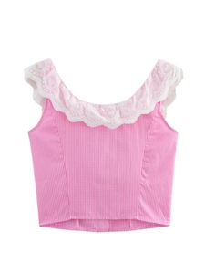 Close-up of pink gingham cropped top featuring a white floral embroidery lace collar