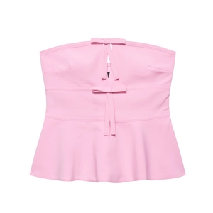 Pink strapless tube top featuring decorative bows, hollow-out details, and a peplum hem