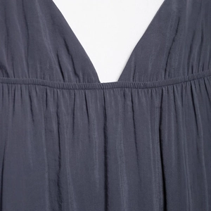 Elegant navy blue V-neck A-line summer dress with smocking elastic waist detail