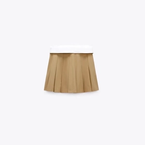 Jupe-short plissée bicolore kaki et blanc pour femme, style d'été minimaliste