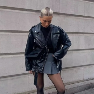 Chic black PU leather biker jacket with belt paired with grey pleated skirt set