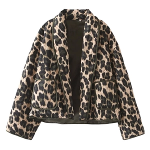 Women's leopard print quilted jacket with dark green piping and front patch pockets