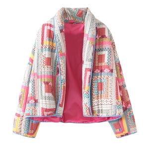 Patchwork quilted jacket with geometric print and pink lining in a classic kimono style cut