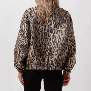 Women's loose leopard print jacket with elastic hem and cuffs shown from the back
